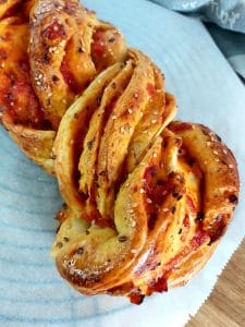Braided bread on a white plate 