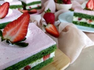 Close-up of Strawberry Spinach Cake garnished with fresh Strawberry.