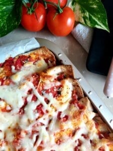 Baked tortillas in a baking dish.