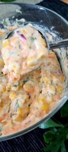 Corn Fritters Batter scooped with an ice cream scoop 