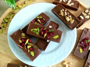 Chocolate Pomegranate Nut Bites on a plate. 