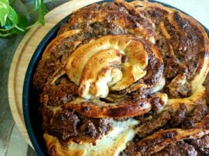 Twisted Almond and Walnut Bread in a baking dish.
