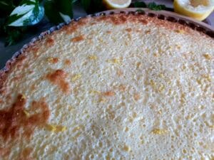 Baked lemon tart in a baking dish.