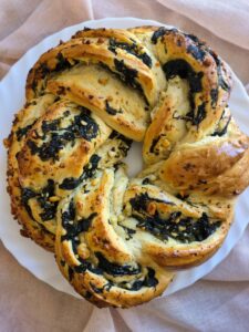 Close-up of golden baked Spring Greens and Cheese Wreath
